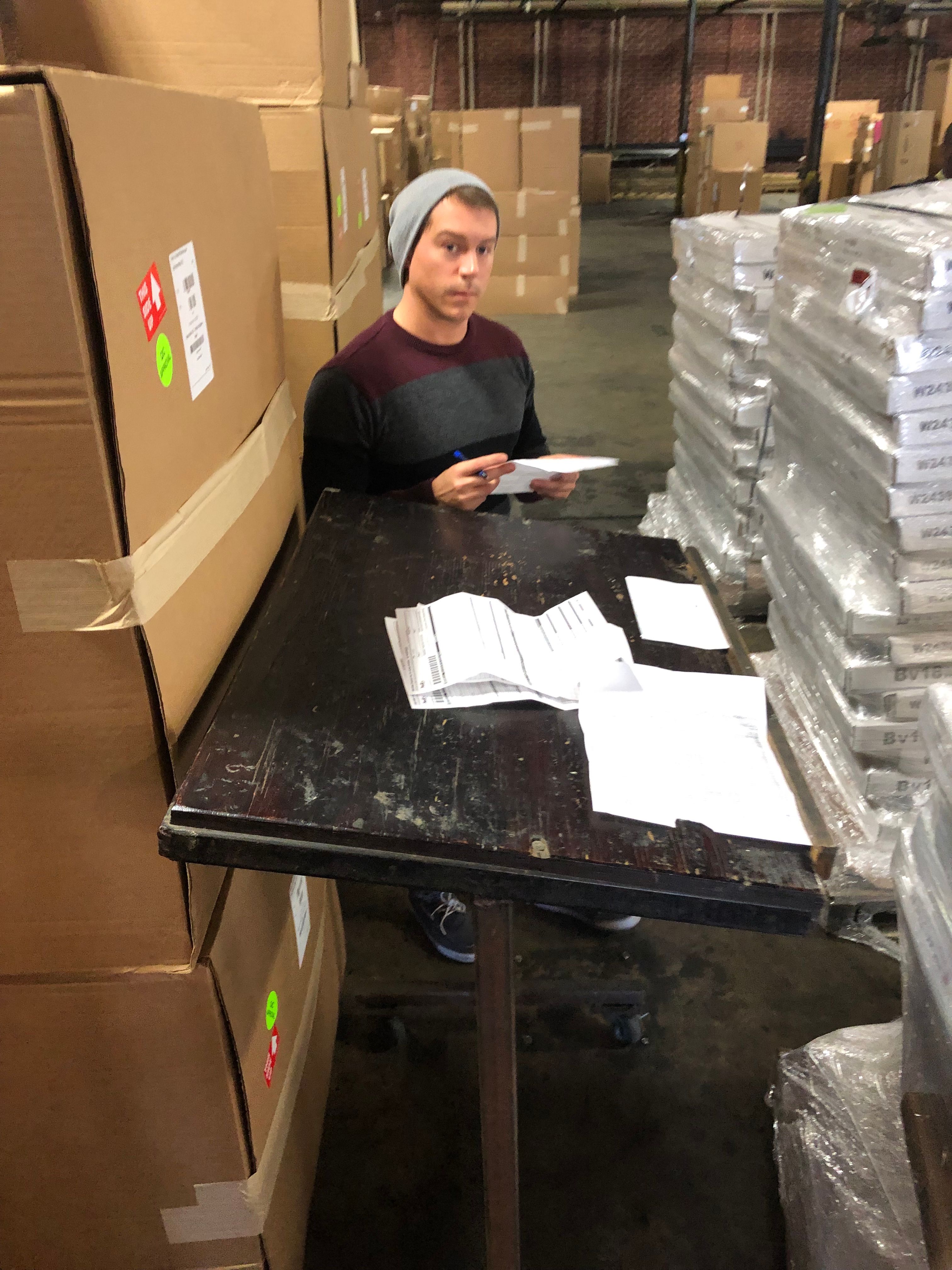 Oxley Cabinet Warehouse Inc Jeremy Is Checking In A Shipment