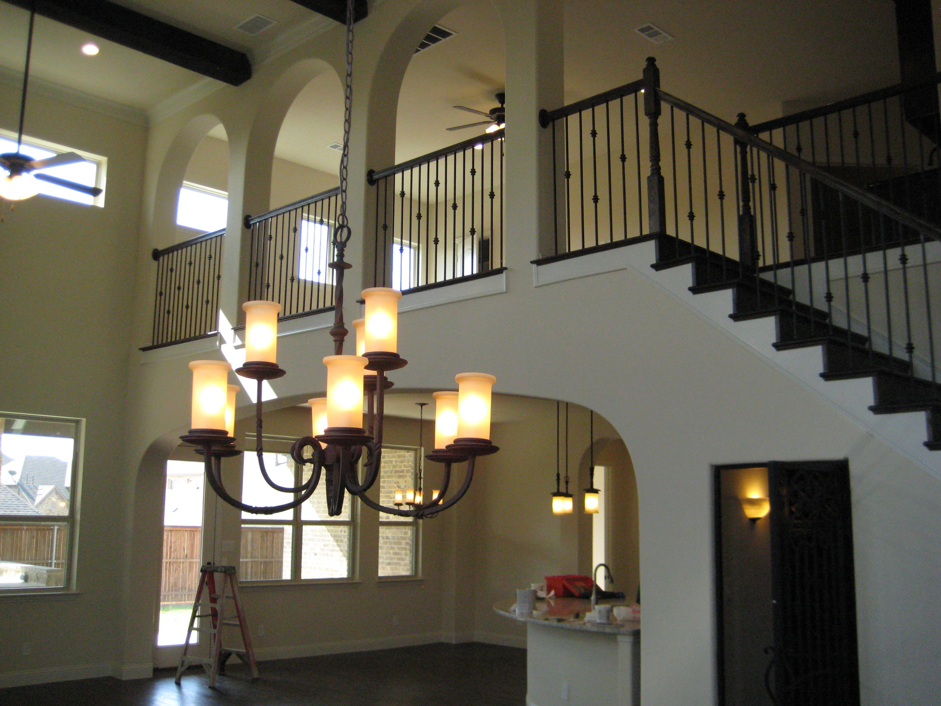 FAMILY ROOM, DINING ROOM AND HANDRAIL