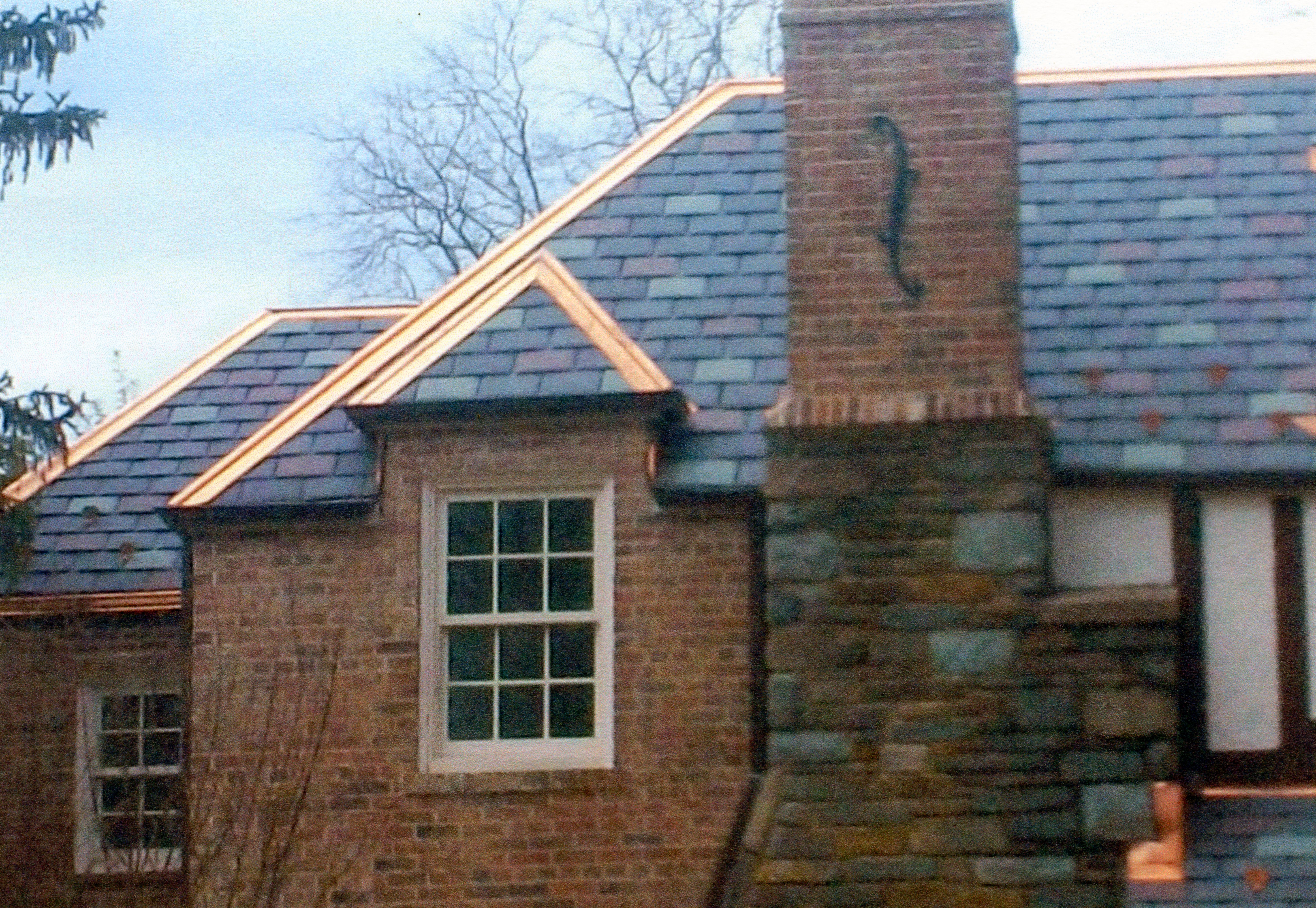 Corley Roofing & Sheet Metal Co., Inc. New Vermont Slate roof with copper accents that we