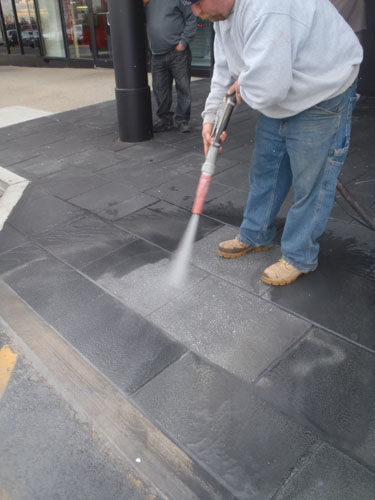 Coating  Removal  from Concrete Pavers utilizing Farrow System